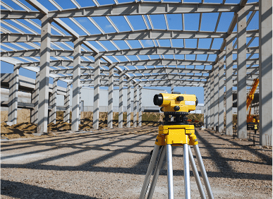 Construction site with surveying equipment